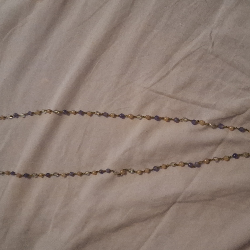 One 108 bead amethyst necklace